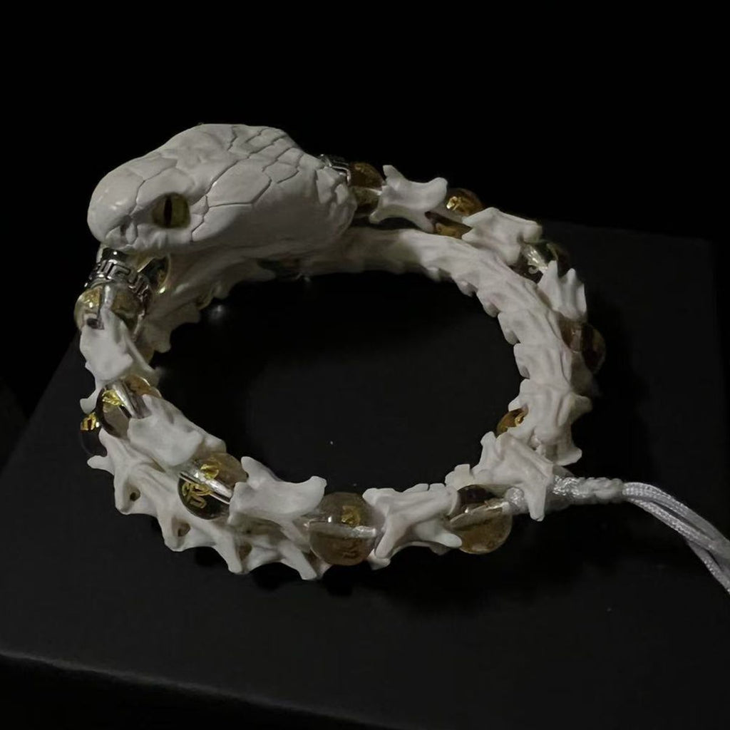 Natural Snake Spine Bracelet with Red Beads – Artisan Bone Jewelry