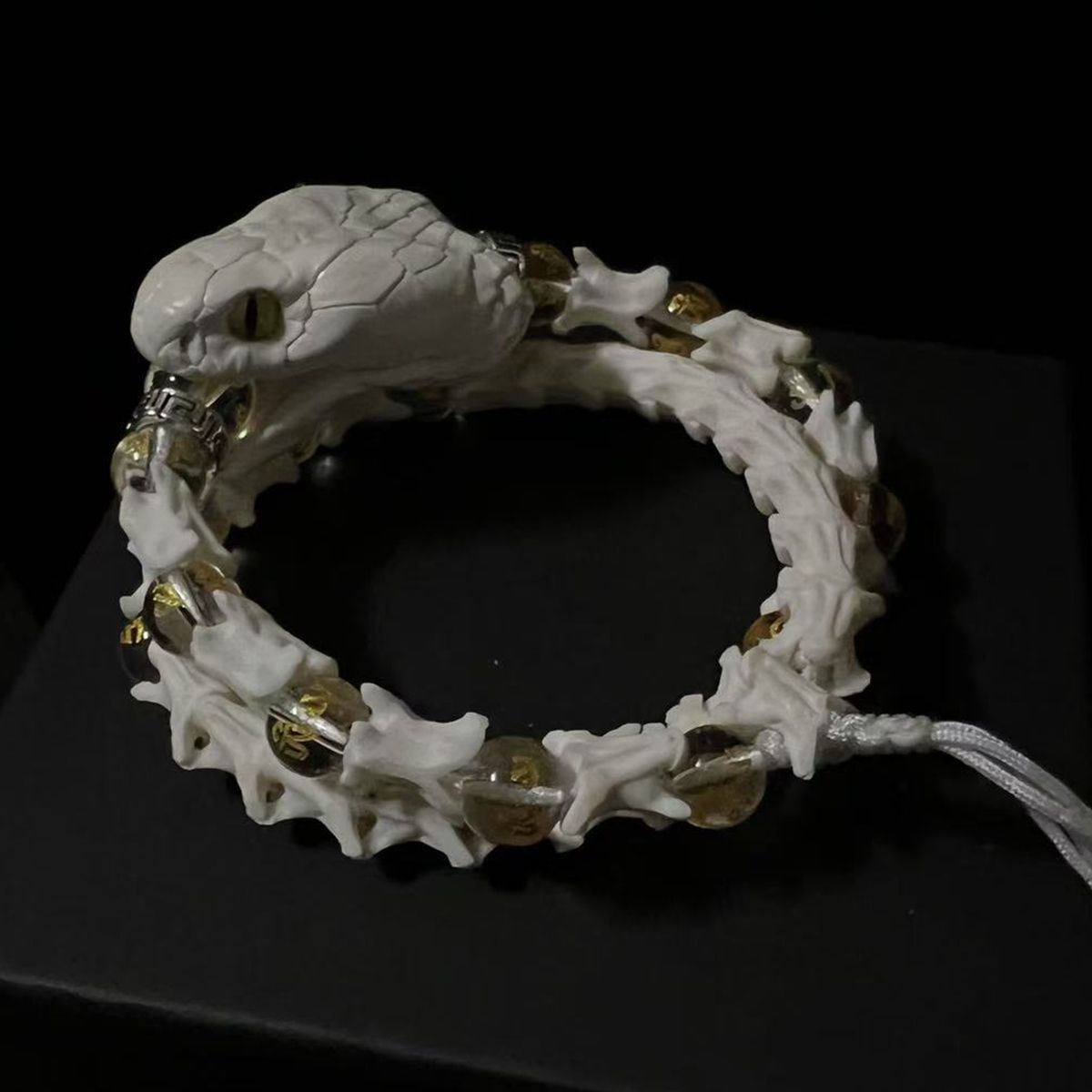 Natural Snake Spine Bracelet with Red Beads – Artisan Bone Jewelry