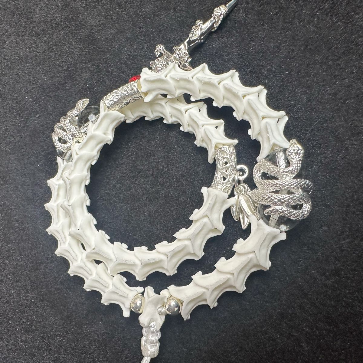 Snake Spine Bracelet – Handcrafted Gothic Style with Cross Charm