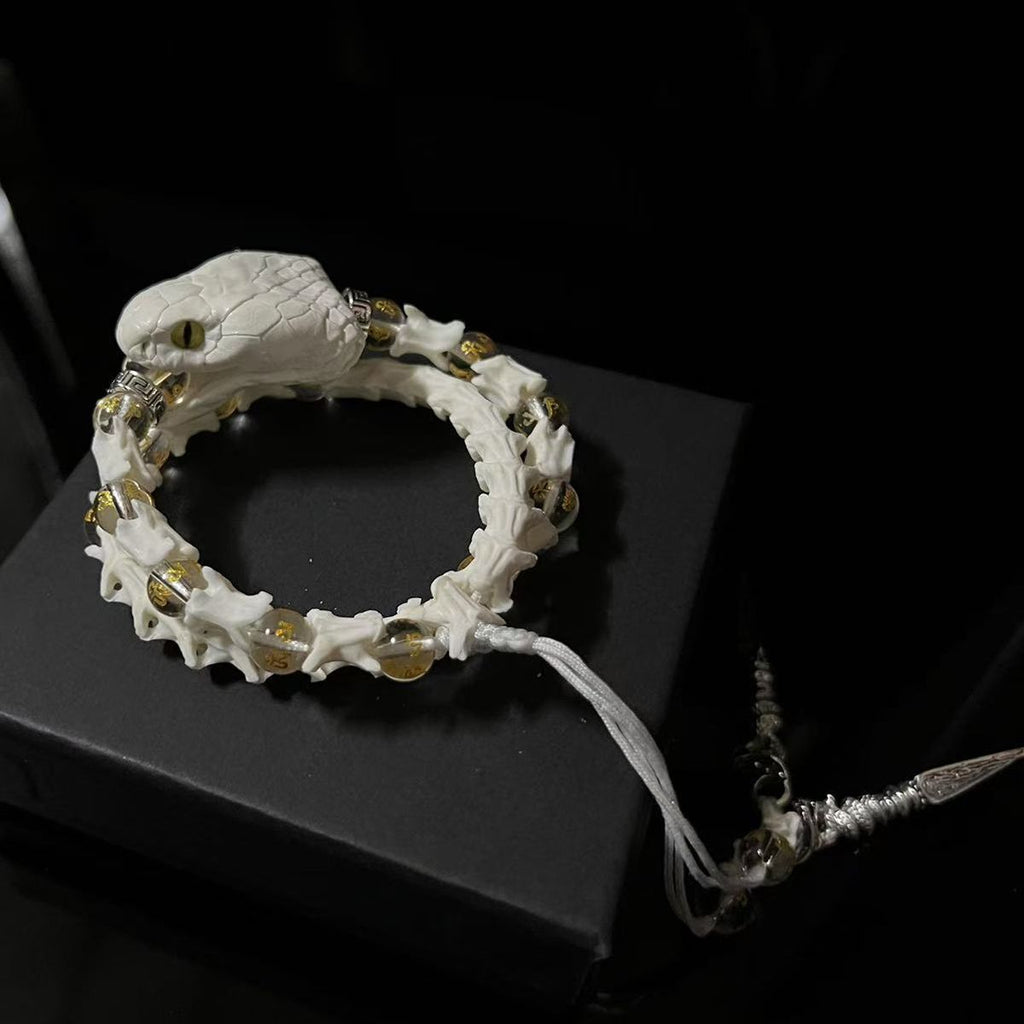 Natural Snake Spine Bracelet with Red Beads – Artisan Bone Jewelry