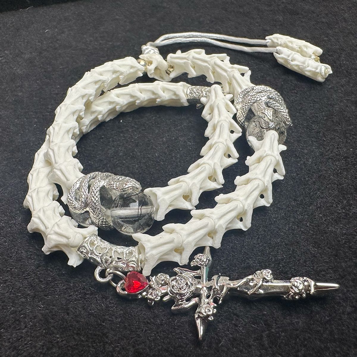 Snake Spine Bracelet – Handcrafted Gothic Style with Cross Charm