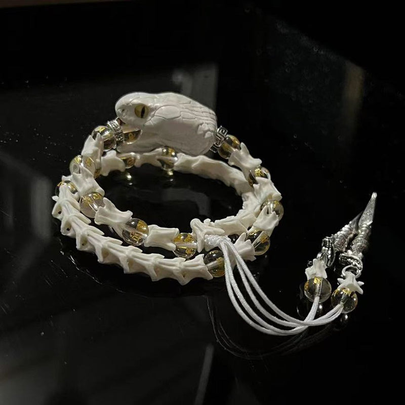 Natural Snake Spine Bracelet with Red Beads – Artisan Bone Jewelry