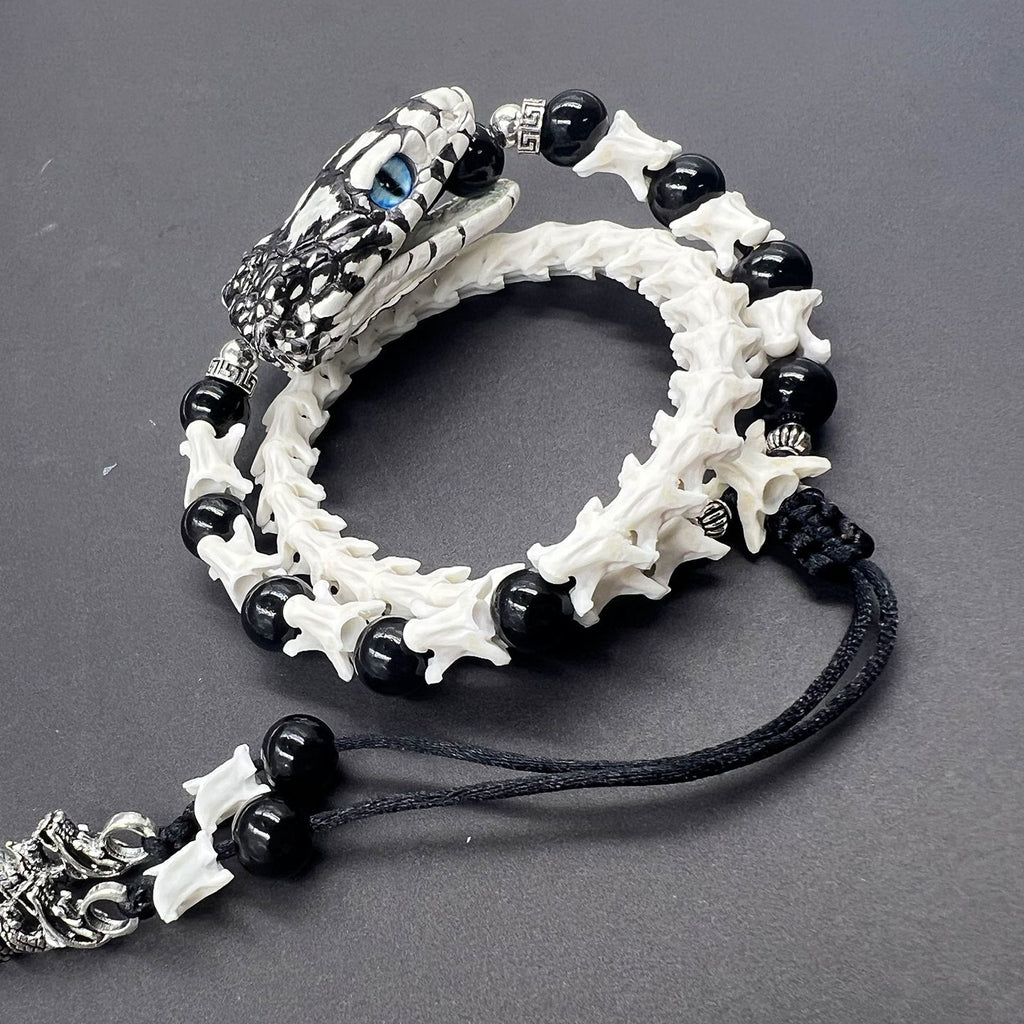 Natural Snake Spine Bracelet with Red Beads – Artisan Bone Jewelry