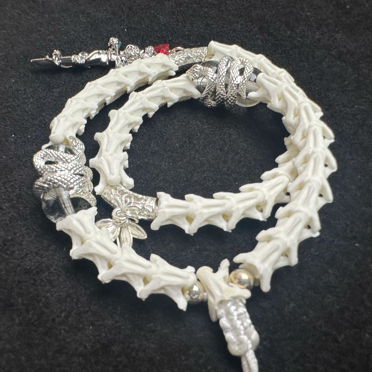 Snake Spine Bracelet – Handcrafted Gothic Style with Cross Charm