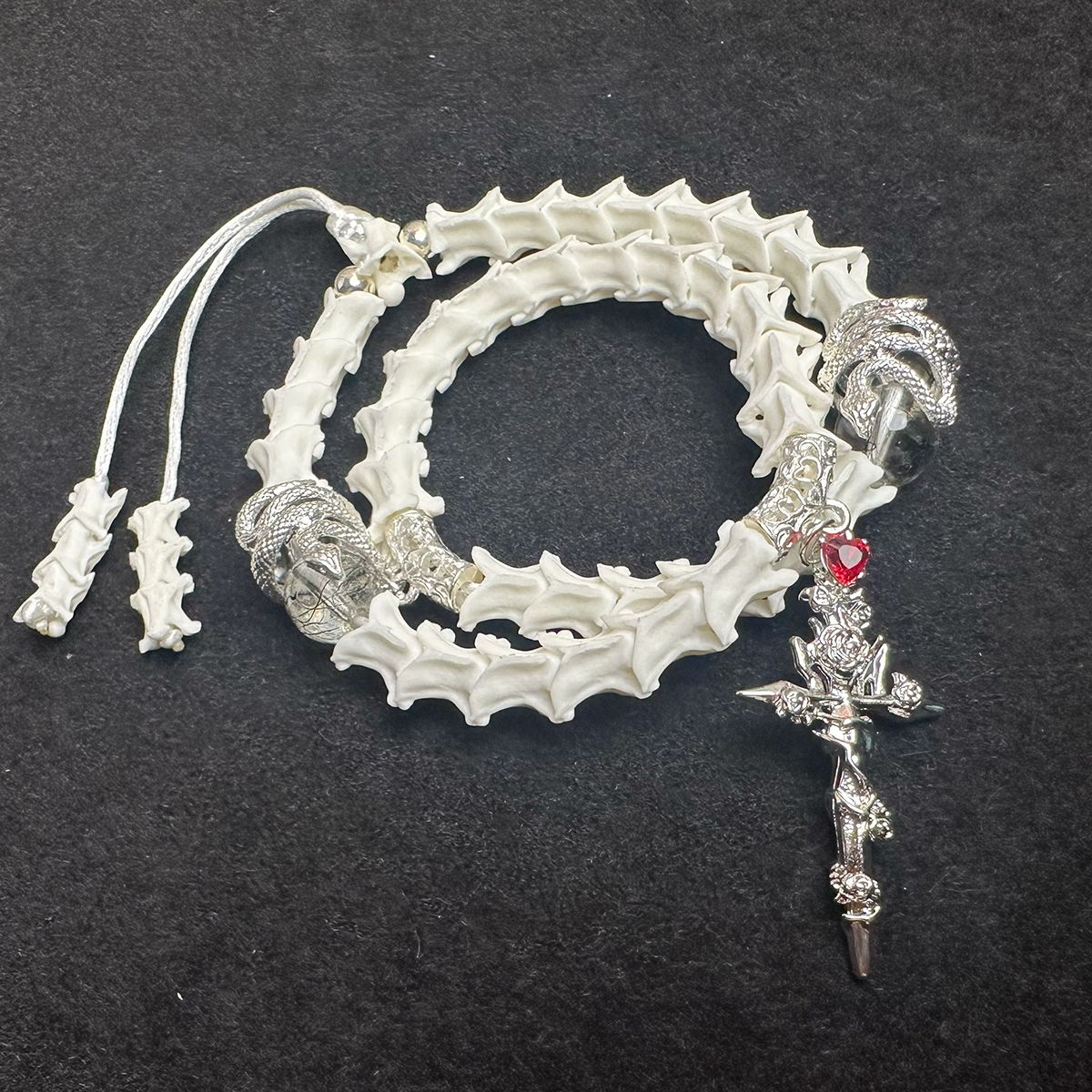 Snake Spine Bracelet – Handcrafted Gothic Style with Cross Charm