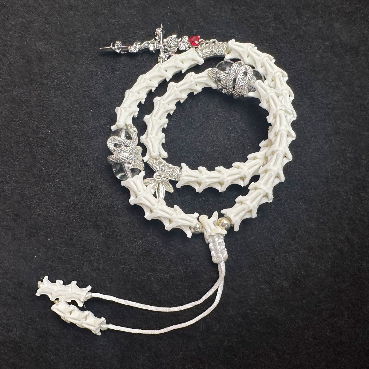 Snake Spine Bracelet – Handcrafted Gothic Style with Cross Charm