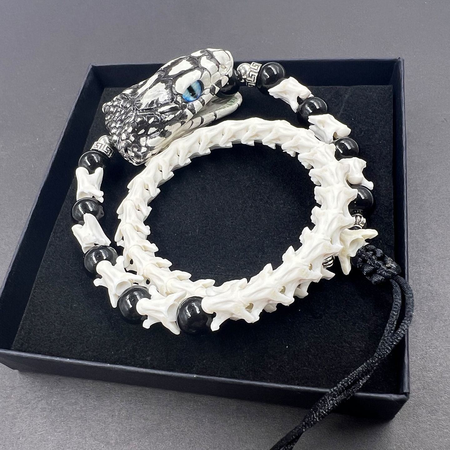 Natural Snake Spine Bracelet with Red Beads – Artisan Bone Jewelry